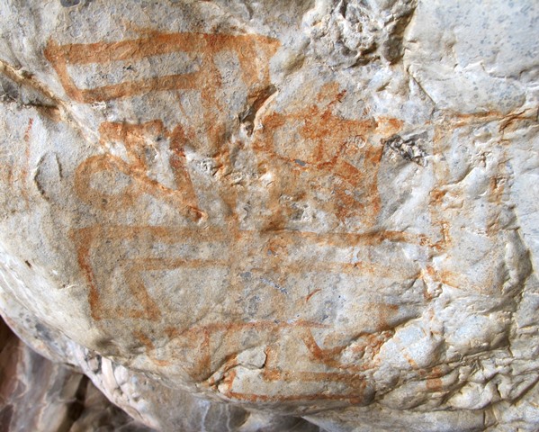 Fig. 56. A swastika with what appears to be the Om/A written thrice and ma once between its four legs. These mystic syllables appear to celebrate the dichotomous universe, consisting of the lower and upper worlds. This esoteric representation from the eastern Changthang was made by bonpo active in the region until about 1240 CE.