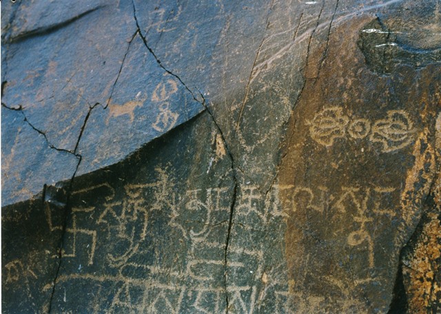 Fig. 58. A rock face chronicling Buddhist influences in northwestern Tibet during the imperial period. It is situated on an ancient east-west route between agricultural regions of the far west and the pastoral Changthang. Carved in a conspicuous location, this rock art and inscription was designed to be noticed.