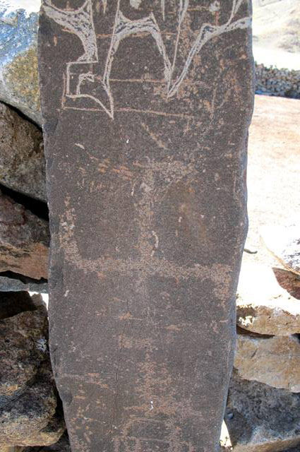 Fig. 80. Clockwise swastika engraved on prehistoric funerary pillar at same site as fig. 79.