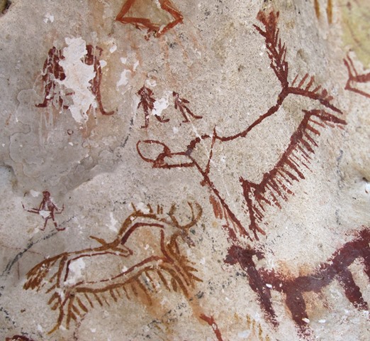 Fig. 2. Five standing archers and two wild yaks situated in the middle of the rear wall of a small cave, Eastern Changthang. Late Bronze Age (?).