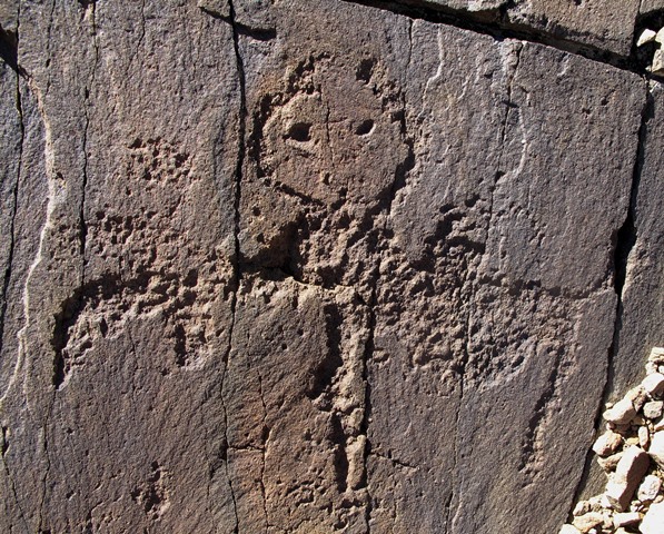 Fig. 13. Deeply carved horseman facing a wild yak, far western Tibet. Iron Age.