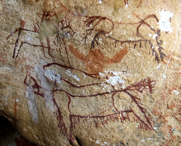 Fig. 16. Mounted bowman killing wild yak from behind with an unfinished and a larger wild yak below, eastern Changthang. Iron Age.