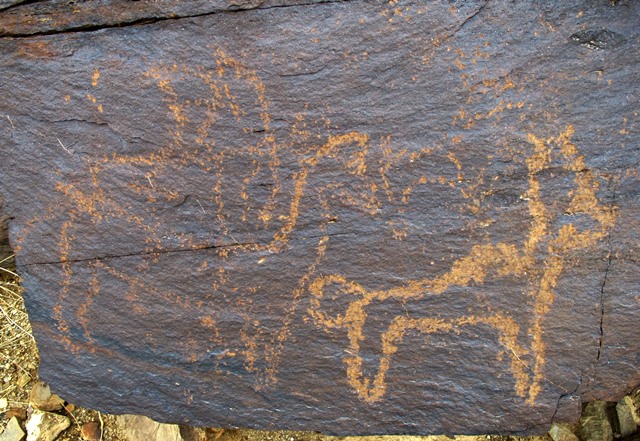 Fig. 31. Mounted archer aiming at wild yak, far western Tibet. Protohistoric period.