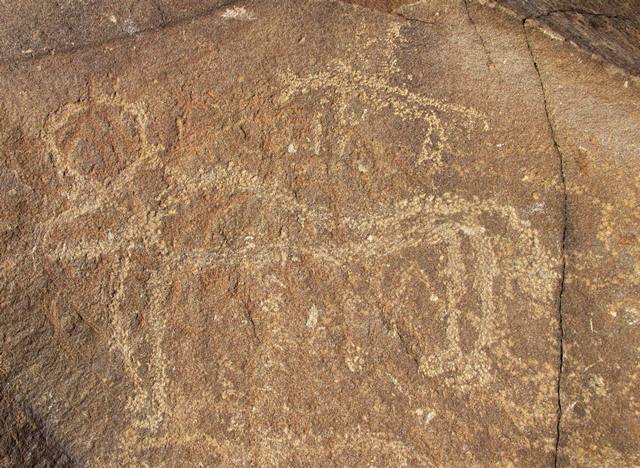 Fig. 39. Mounted archer and giant wild yak, far western Tibet. Protohistoric period.