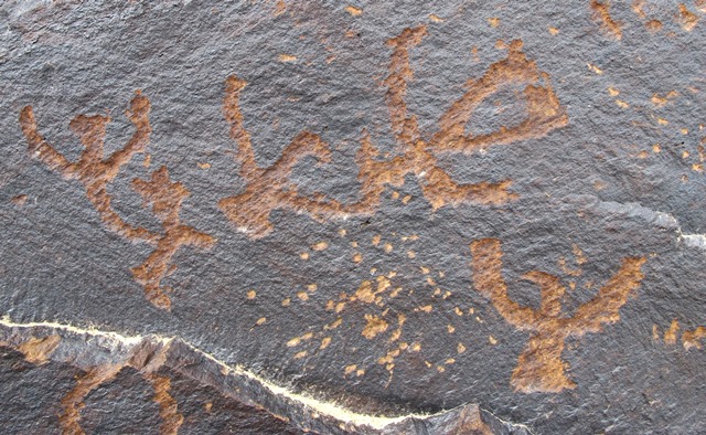 Fig. 9: A group of four or five birds with outstretched wings. Bronze Age or Iron Age.