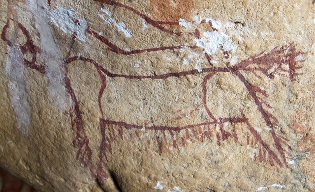 Fig. 19: A wild bull yak boldly painted in an ochre with a magenta hue. Late Bronze Age or Iron Age.