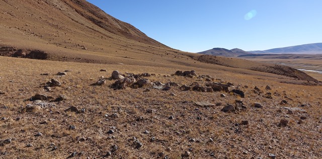 Fig. 29. The quadrate funerary enclosure FS9 viewed from the west. Note the partially intact perimeter walls and raised center of the structure.