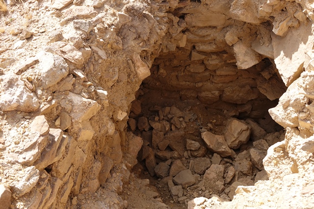 Fig. 38. Excavation of the temple-tomb of the Central Complex. The wall at the bottom left corner of the image is a portion of the east/forward wall. The wall in the upper middle part of the image is the rear/west wall.