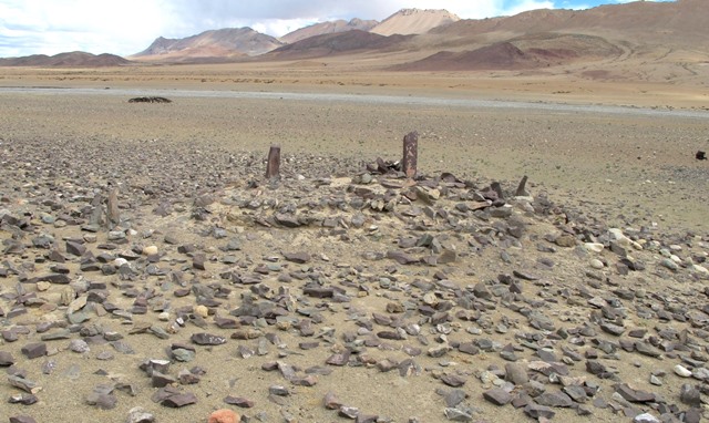 Fig. 28. The temple-tomb seen from the northwest. The pillars on top and to the left of the mound are not original structural features.