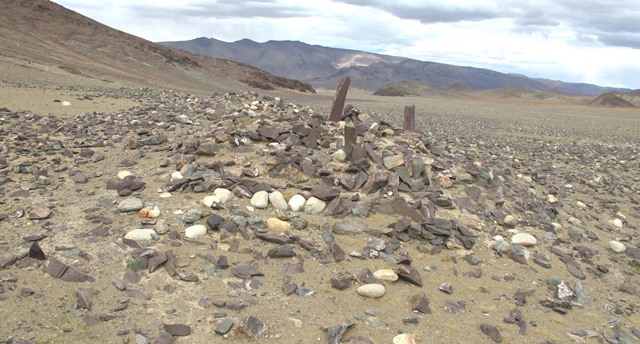 Fig. 33. The southwest side of the temple-tomb. Note the coherent wall fragments at the base of the structure.