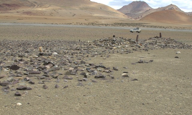 Fig. 38. Mound I (extreme right), Mound II (middle right) and adjacent rocky dispersions to the north (left side).