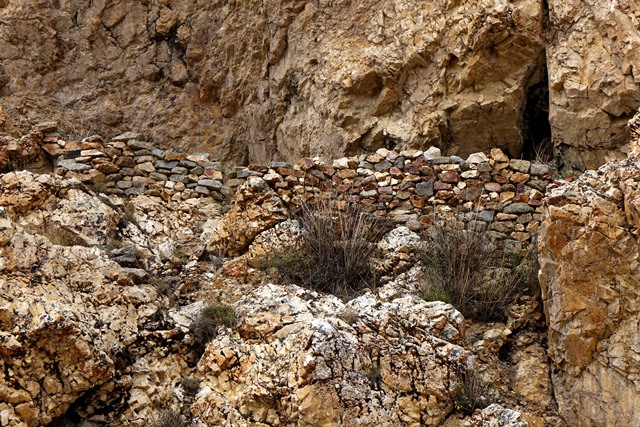 Fig. 19. A close-up of the outer wall of an inaccessible cave shelter at Gondak. This wall probably once enclosed the overhanging formation, creating an entirely enclosed space.