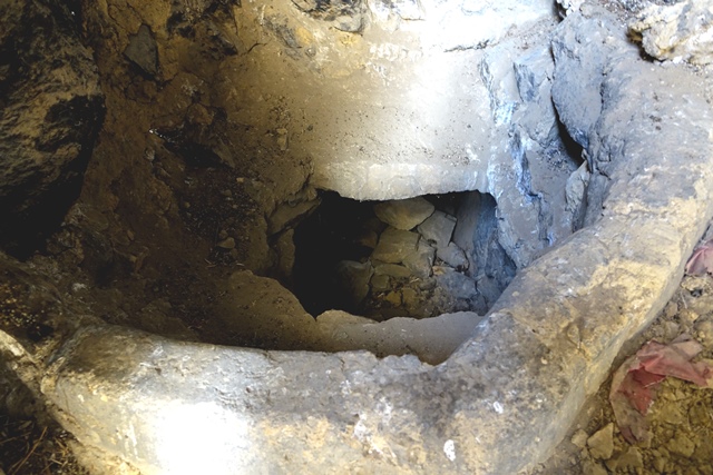Fig. 29. Opening to the basement with adobe berm around it. This subterranean space may possibly have had ritual functions associated with chthonic spirits.