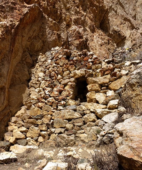 Fig. 45. Forward face of the lowermost recognizable residential structure in the upper residential complex. This wall is punctuated in the middle by an entranceway with a heavy stone lintel.