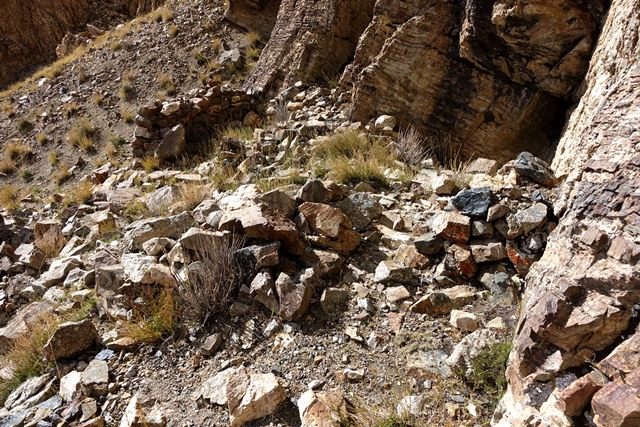 Fig. 51. Another view of what remains of the residential complex at the base of the grey outcrop.