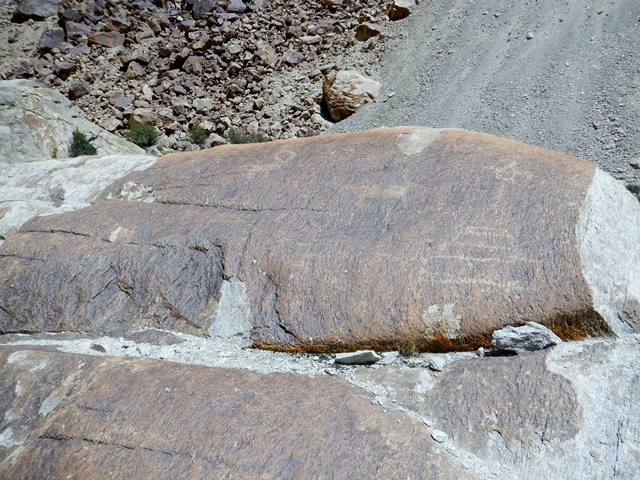 Fig. 13. Weathered boulder with yak, deer (?) and solitary chorten.