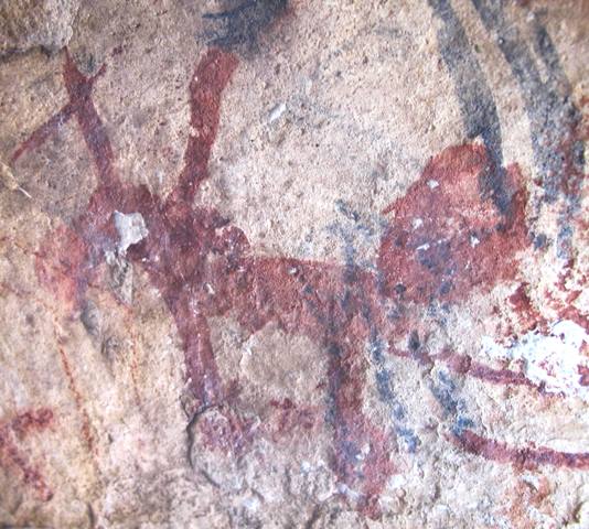 Fig. 108. Lone wild yak Prominent motifs: large wedge-shaped tail; forked horns; anterior hump; rectangular snout; flat belly; two thick, unflexed legs Body: silhouetted Technique: painted, red ochre Region: Eastern Changthang Estimated Age: Protohistoric period