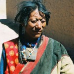 A nomad of western Tibet wearing a celestial metal amulet